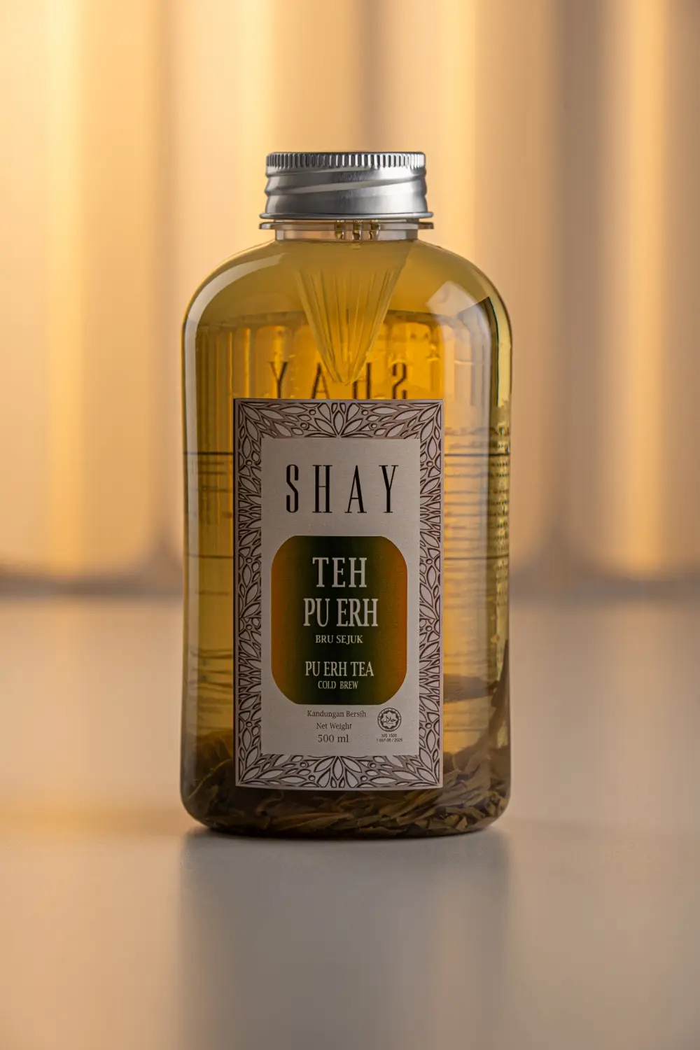 SHAY Puerh aged tea with bright floral, fruity and earthy character